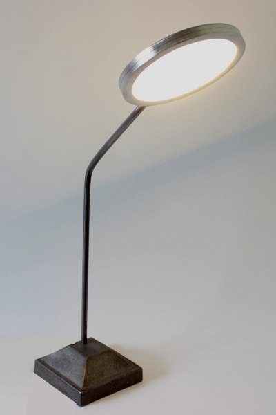 Geo Bent small is a minimalist lamp part of the Geometrika collection. Very modern and unique